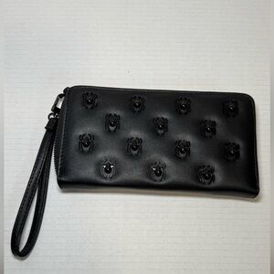 Betsey Johnson black faux leather zip-around wristlet/wallet